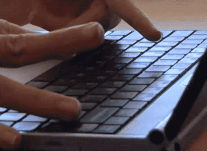 An animation of hands typing with unpredictable motions